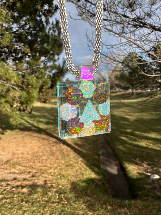 Dichroic glass pendant with nine opals