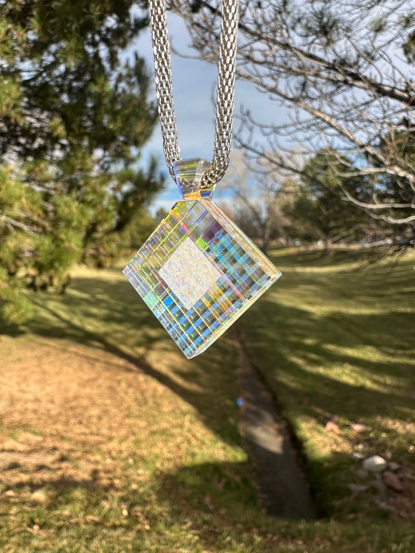 Dichroic glass pendant with white opal